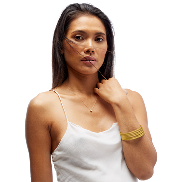 VIRTUOUS CIRCLE GOLD TONE SKINNY BANGLE